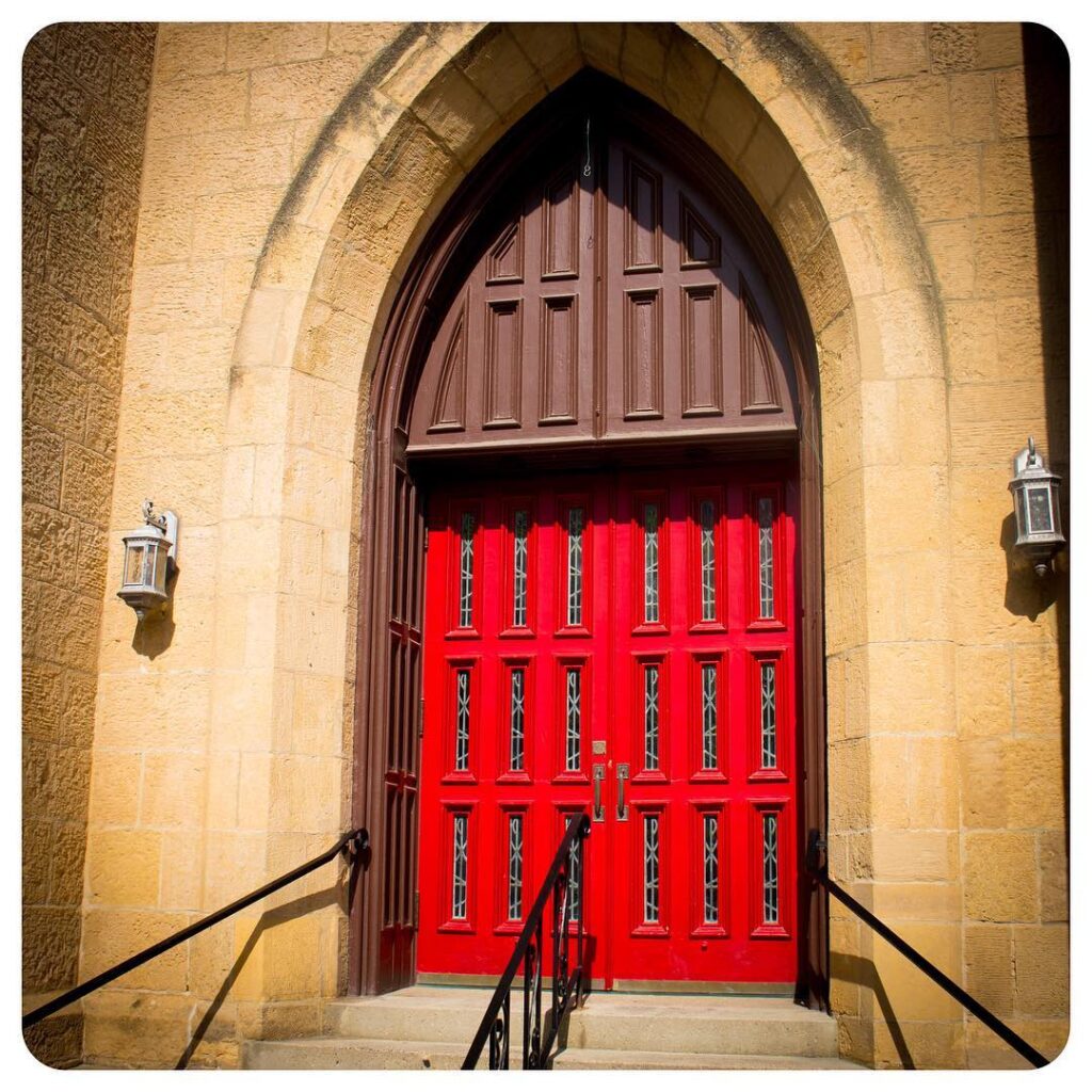Red church doors on the capitol square