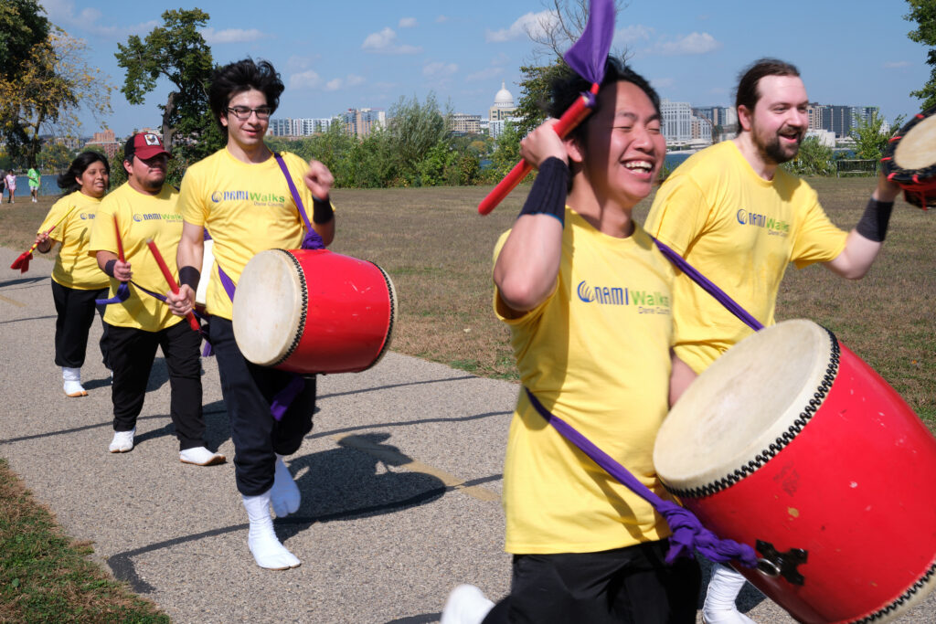 Taiko drummers performing on the NAMIWalks Dane County event in Madison, Wisconsin, on October 4, 2025.